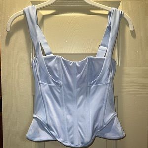 Light blue (almost periwinkle) bustier stretchy top. Worm once and super cute🩵